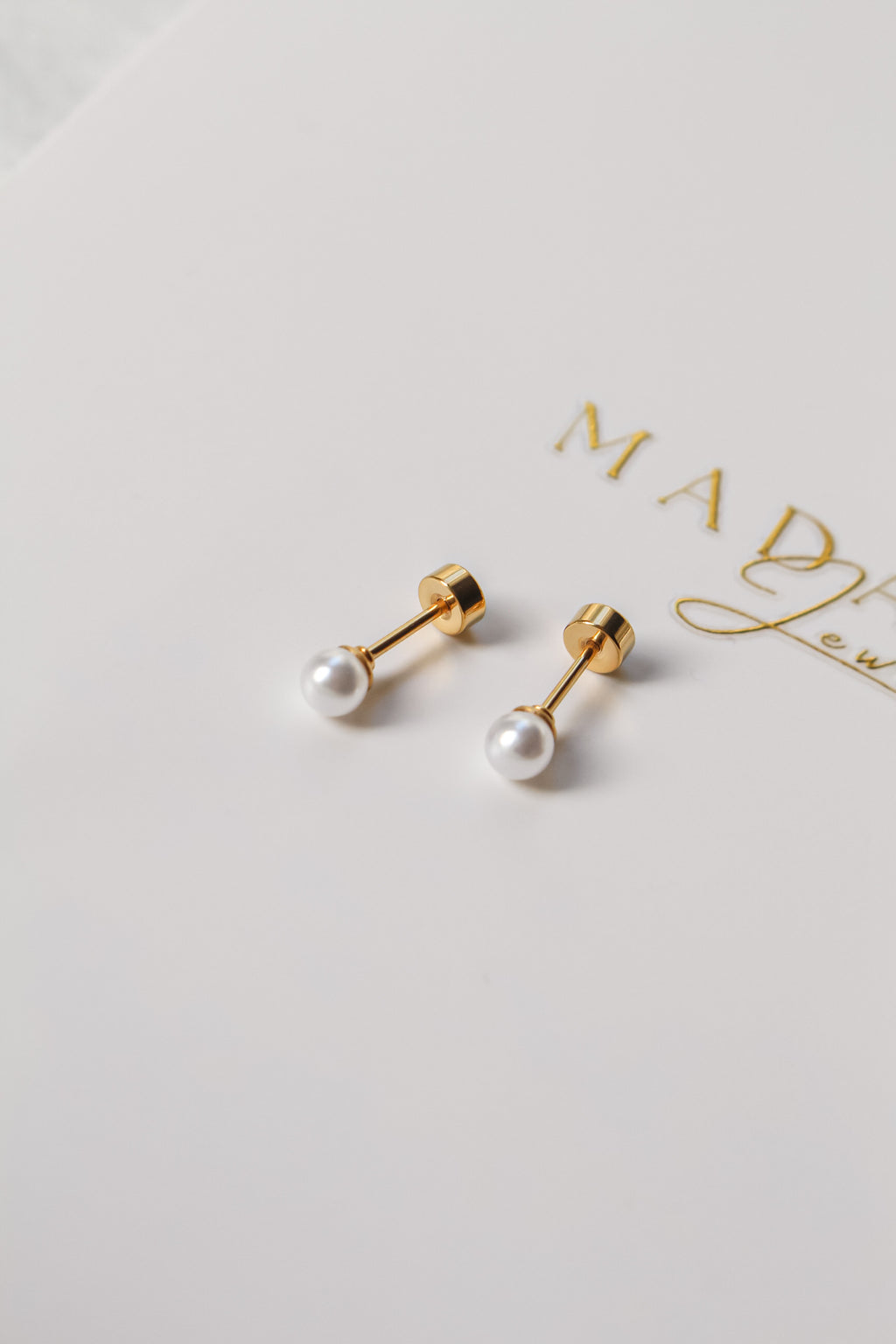 PERLITA Flat screw end Earrings