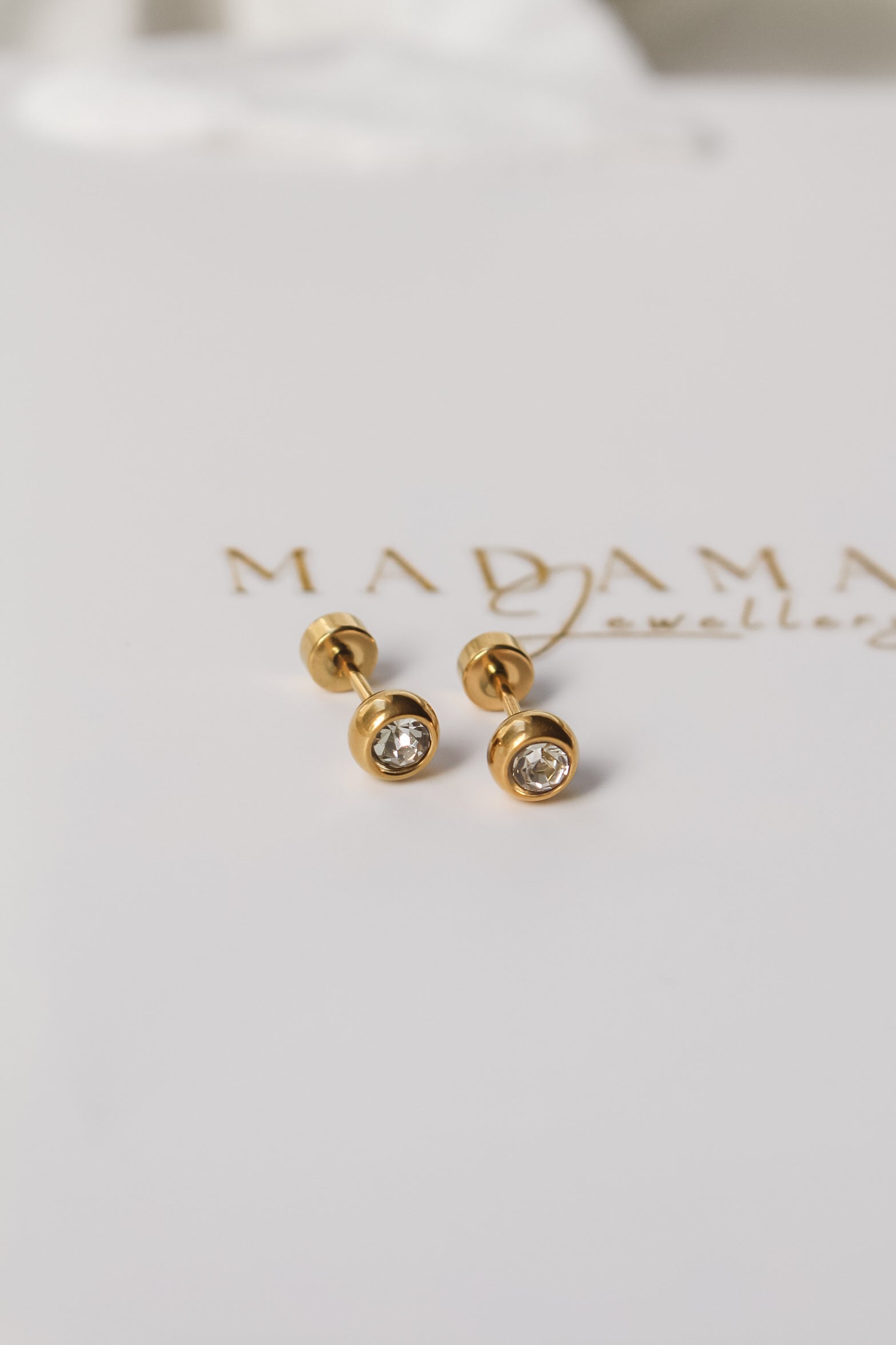 MARTA Helix Flat screw end earrings