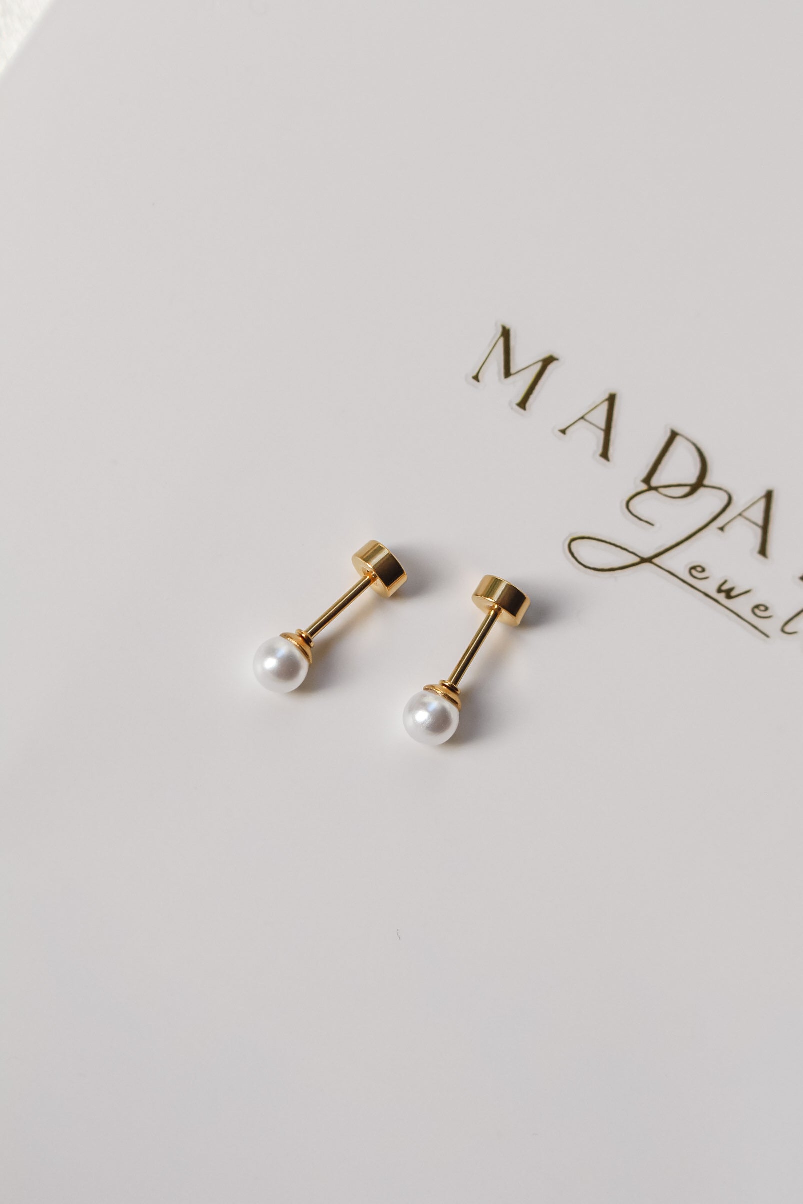 PERLITA Flat screw end Earrings